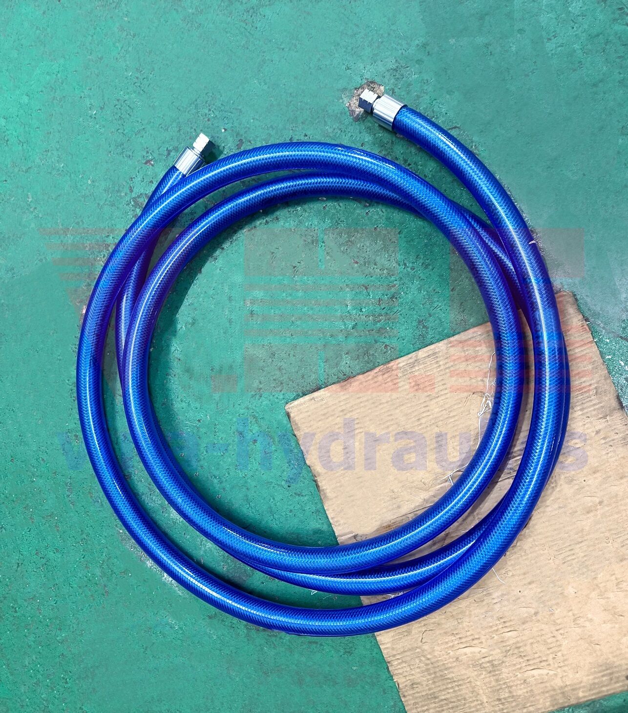 Alfagomma hydraulic hose, crimped with JIC fittings, stainless steel braided, and covered with water hose