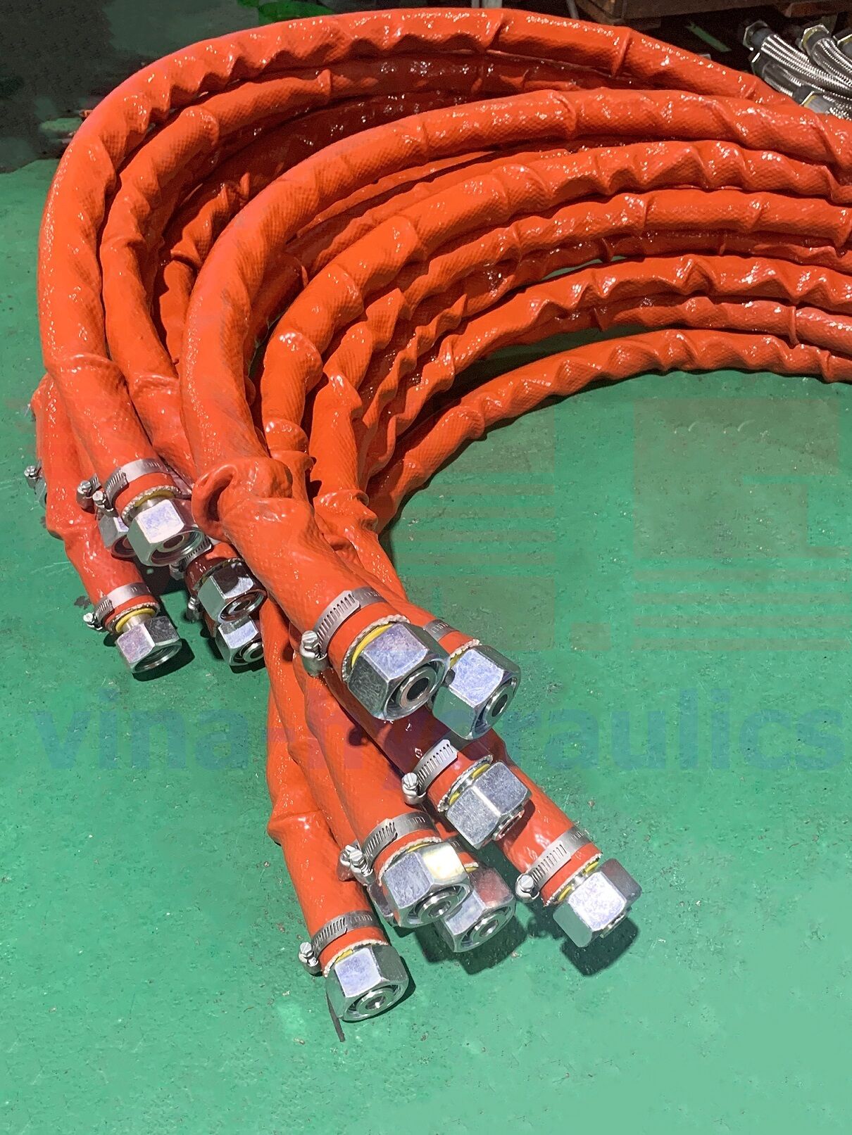 50 Vitillo hydraulic hoses, 4SP 3/4", 4 layers of TeknoSpir TS4SP12 steel with genuine Vitillo 24°M36x2 Crimping fittings pressed and covered with steel mesh and insulated fireproof Pyrojacket cover.