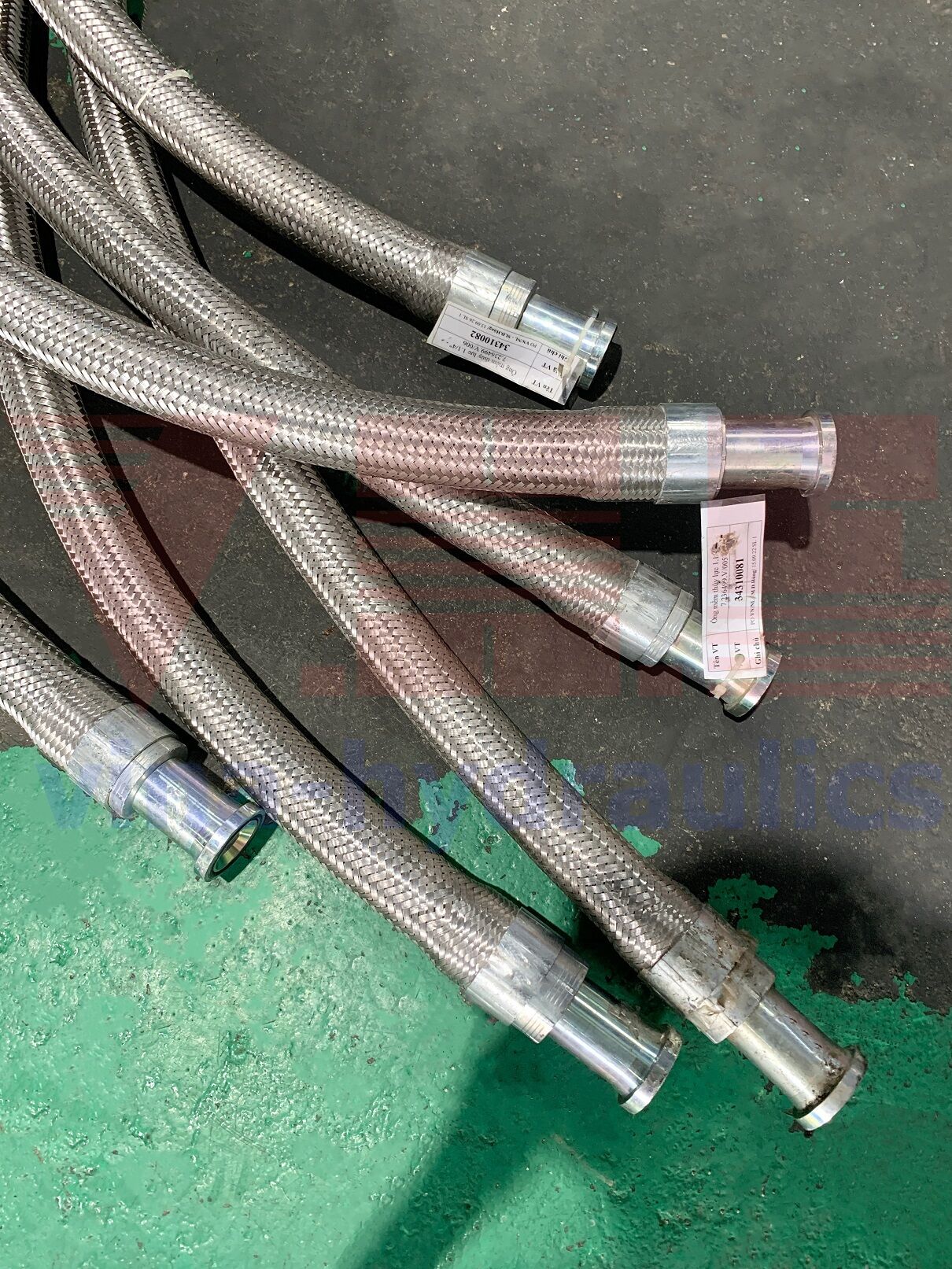 g Parker, Vitillo 1.1/4'' 4SH hydraulic hose covered with stainless steel mesh